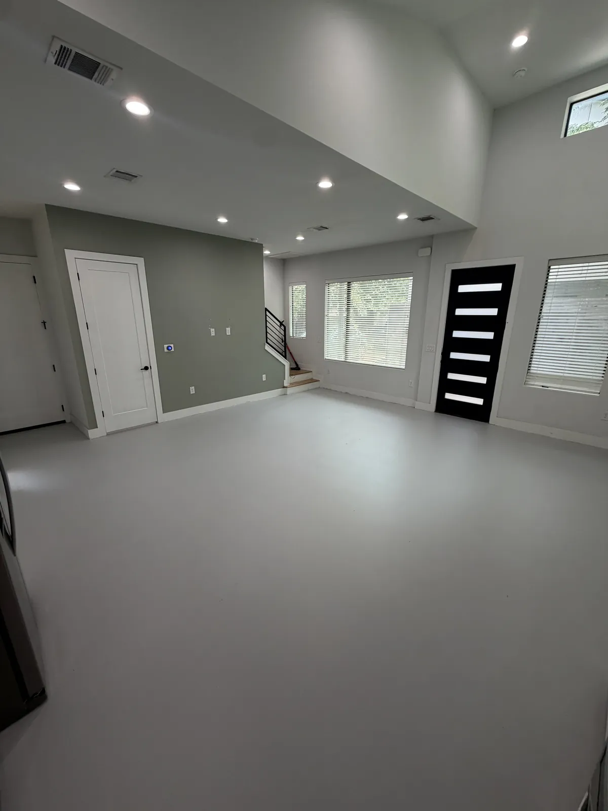 Coated floor in an open commercial interior