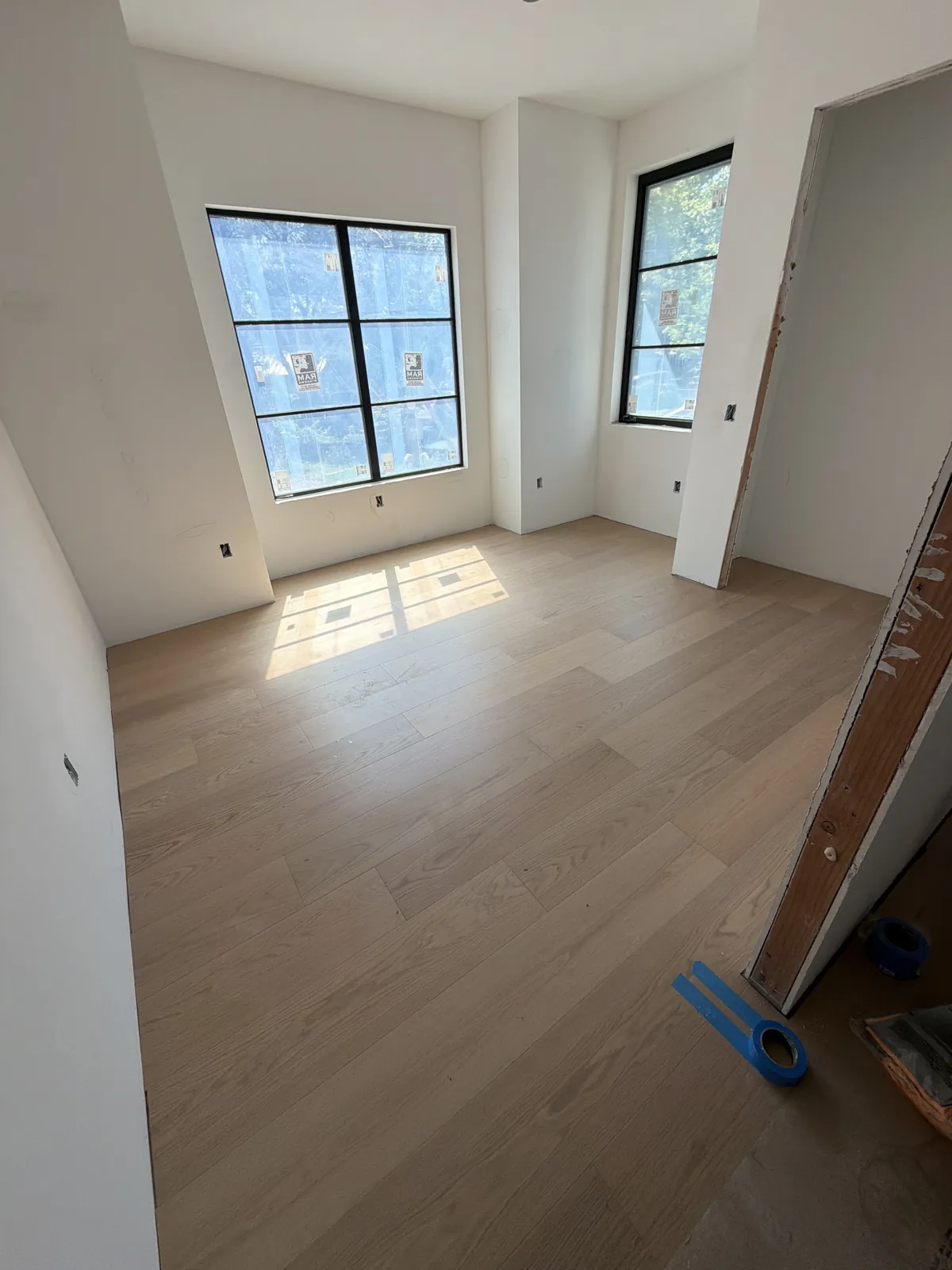 White oak floor with morning light across the grain