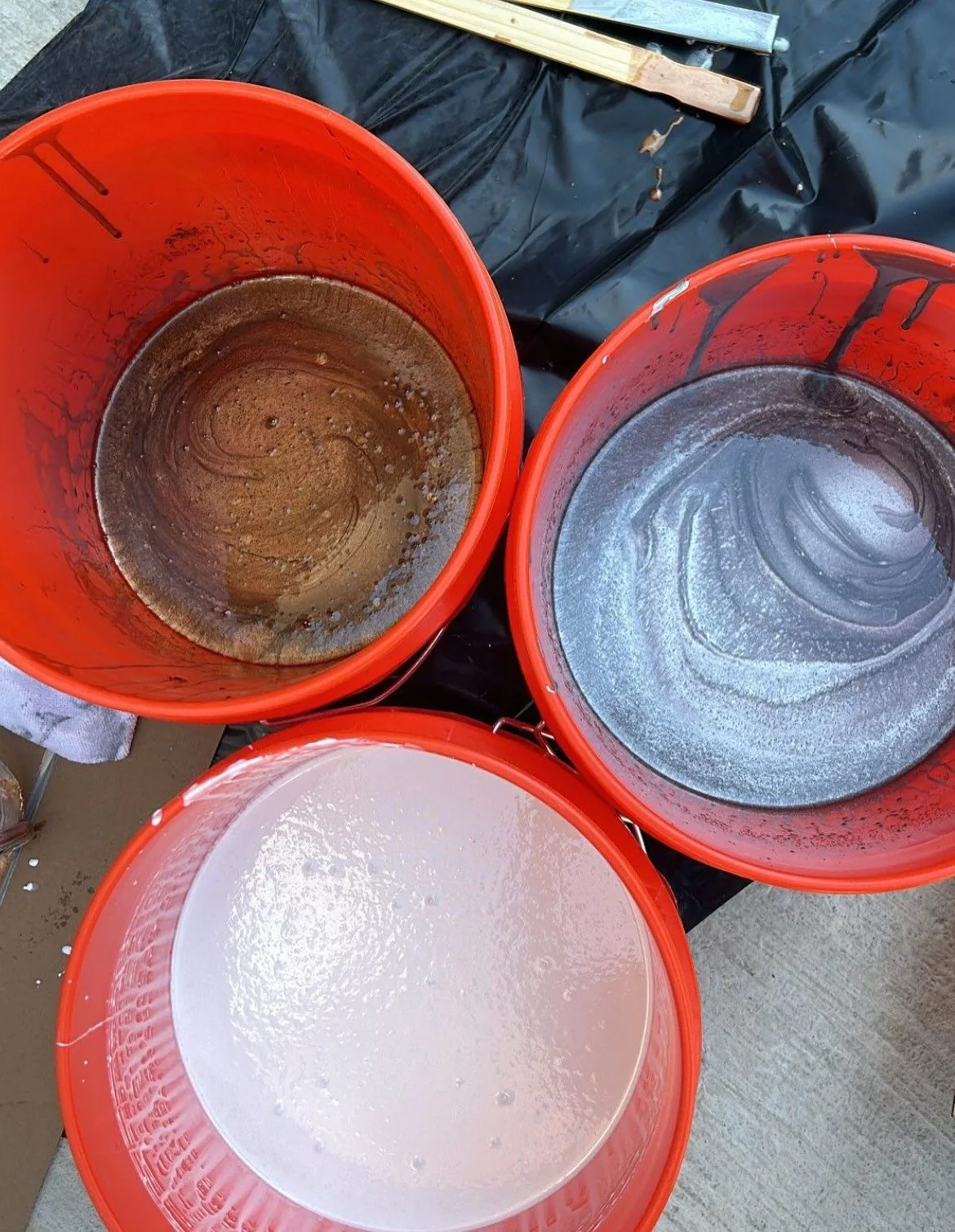 Copper, silver and pearl metallic pigment mixed into resin before a pour