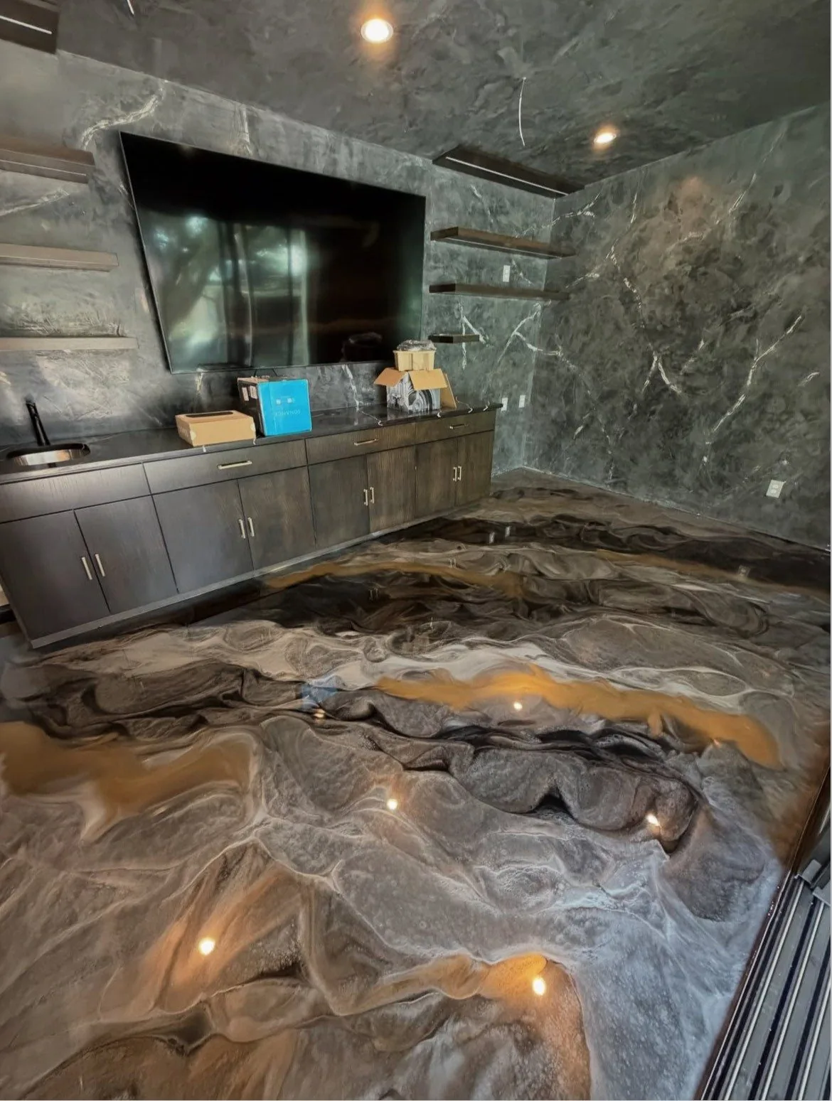 Copper metallic coated floor in a commercial kitchen